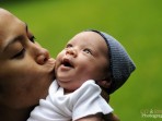 Newborn Portrait, Mom Kissing Baby